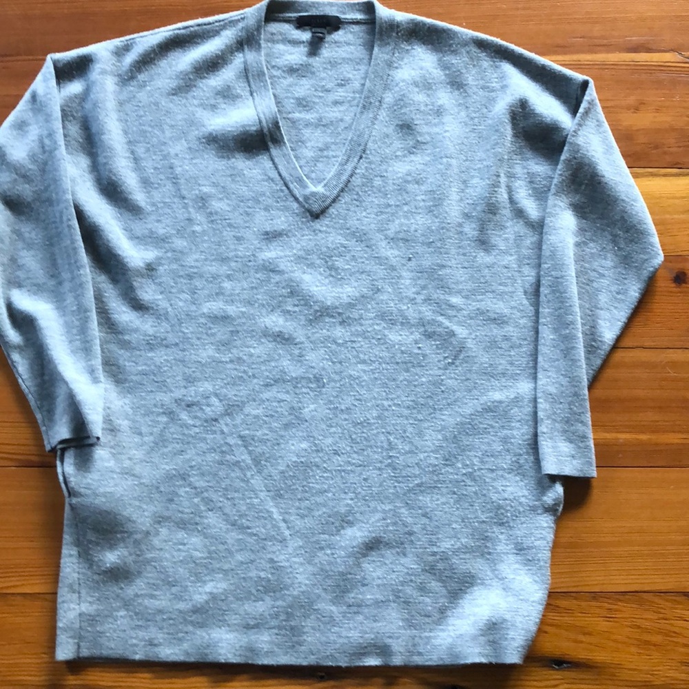 Women’s long sleeve sweater.